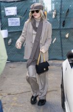 MILEY CYRUS Arrives at JFK Airport in New York 12/12/2021