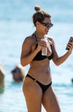 MONTANA BROWN in a Black Bikini at a Beach in Barbados 12/28/2021