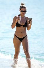 MONTANA BROWN in a Black Bikini at a Beach in Barbados 12/28/2021