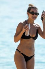 MONTANA BROWN in a Black Bikini at a Beach in Barbados 12/28/2021