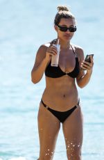 MONTANA BROWN in a Black Bikini at a Beach in Barbados 12/28/2021
