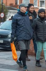 NAOMIE HARRIS Out with Her Mother and Stepfather in London 12/13/2021