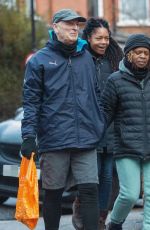 NAOMIE HARRIS Out with Her Mother and Stepfather in London 12/13/2021