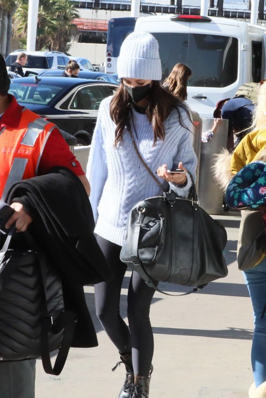 NINA DOBREV Arrives in Los Angeles 12/22/2021