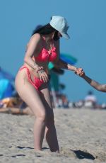 NOAH and BRANDI CYRUS in Bikinis at a Beach in Miami 12/29/2021