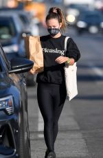 OLIVIA WILDE in a Sweatshirt from Boyfriend Harry Styles New Beauty Line, Pleasing Out in Los Angeles 12/06/2021