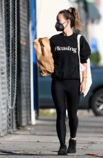 OLIVIA WILDE in a Sweatshirt from Boyfriend Harry Styles New Beauty Line, Pleasing Out in Los Angeles 12/06/2021