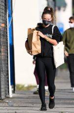 OLIVIA WILDE in a Sweatshirt from Boyfriend Harry Styles New Beauty Line, Pleasing Out in Los Angeles 12/06/2021