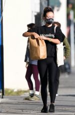 OLIVIA WILDE in a Sweatshirt from Boyfriend Harry Styles New Beauty Line, Pleasing Out in Los Angeles 12/06/2021