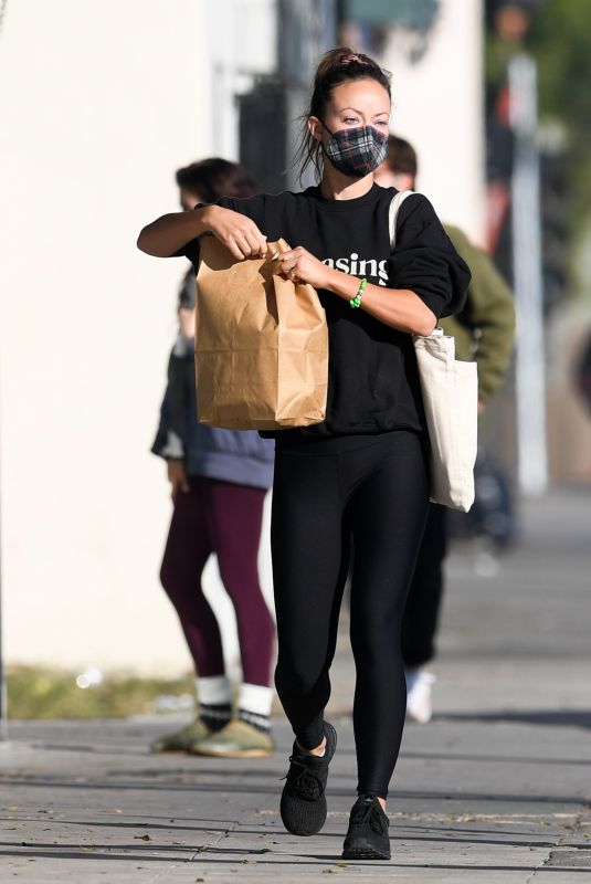 OLIVIA WILDE in a Sweatshirt from Boyfriend Harry Styles New Beauty Line, Pleasing Out in Los Angeles 12/06/2021