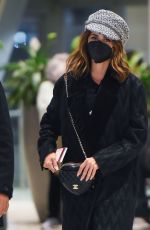 PENELOPE CRUZ Arrives at JFK Airport in New York 12/15/2021