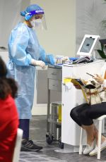REBEL WILSON at a Covid Testing Center in Sydney 12/13/2021