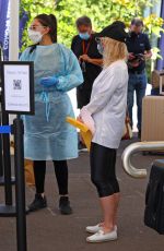 REBEL WILSON at a Covid Testing Center in Sydney 12/13/2021