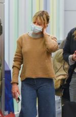 SIENNA MILLER and CARA DELEVINGNE at JFK Airport in New York 12/30/2021