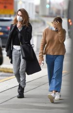 SIENNA MILLER and CARA DELEVINGNE at JFK Airport in New York 12/30/2021