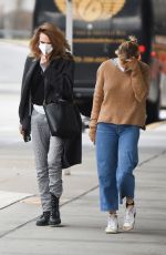 SIENNA MILLER and CARA DELEVINGNE at JFK Airport in New York 12/30/2021