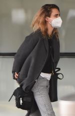 SIENNA MILLER and CARA DELEVINGNE at JFK Airport in New York 12/30/2021