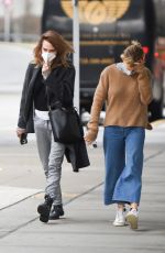 SIENNA MILLER and CARA DELEVINGNE at JFK Airport in New York 12/30/2021