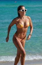 SYLVIE MEIS in a Orange Bikini at a Beach in Miami 12/07/2021