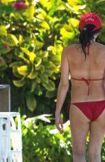 ANDREA CORR in a Red Bikini at a Beach in Barbados 01/01/2022