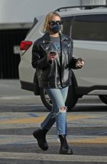 ASHLEY BENSON in Leather Jacket and Ripped Denim Out in Los Angeles 01/12/2022