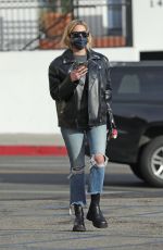 ASHLEY BENSON in Leather Jacket and Ripped Denim Out in Los Angeles 01/12/2022