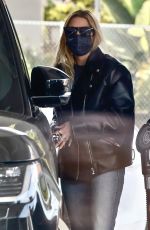 ASHLEY BENSON in Leather Jacket and Ripped Denim Out in Los Angeles 01/12/2022