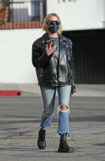 ASHLEY BENSON in Leather Jacket and Ripped Denim Out in Los Angeles 01/12/2022