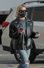 ASHLEY BENSON in Leather Jacket and Ripped Denim Out in Los Angeles 01/12/2022