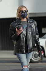 ASHLEY BENSON in Leather Jacket and Ripped Denim Out in Los Angeles 01/12/2022