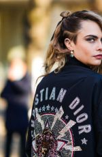 CARA DELVINGNE Arrivves at Dior Show at Paris Fashion Week 01/24/2022