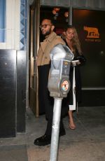 CHRISSY TEIGEN and John Legend at Mother Wolf Italian Restaurant in Los Angeles 02/13/2022