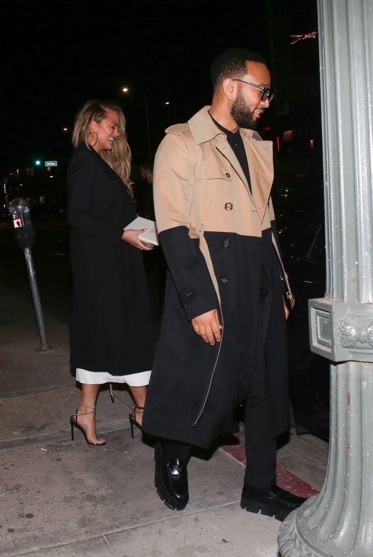 CHRISSY TEIGEN and John Legend at Mother Wolf Italian Restaurant in Los Angeles 02/13/2022