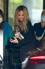 CHRISSY TEIGEN Arrives Back Home in Los Angeles 01/19/2022
