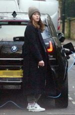 CLAIRE FOY Charges Her Electric Car Out in Hampstead 01/18/2022