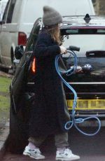 CLAIRE FOY Charges Her Electric Car Out in Hampstead 01/18/2022