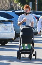 CLARA BERRY and KJ Apa Out with Their Baby in Los Angeles 01/02/2022