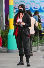 DAISY LOWE Out at Universal Studios in Hollywod 01/28/2022