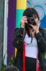 DAISY LOWE Out at Universal Studios in Hollywod 01/28/2022