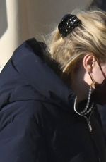 DAKOTA FANNING Out Shopping in Venice 01/19/2022