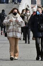DAKOTA FANNING Taking a Break with Friends in Venice 01/21/2022
