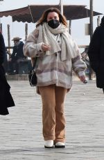 DAKOTA FANNING Taking a Break with Friends in Venice 01/21/2022