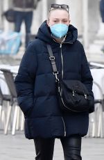 DAKOTA FANNING Taking a Break with Friends in Venice 01/21/2022