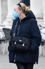 DAKOTA FANNING Taking a Break with Friends in Venice 01/21/2022