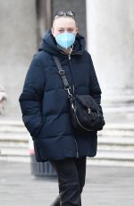 DAKOTA FANNING Taking a Break with Friends in Venice 01/21/2022