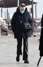 DAKOTA FANNING Taking a Break with Friends in Venice 01/21/2022