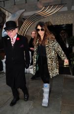 ELIZABETH HURLEY Leaves Scott