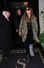 ELIZABETH HURLEY Leaves Scott
