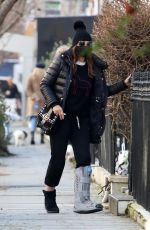 ELIZABETH HURLEY Sporting Her Ankle Brace Out in London 01/27/2022