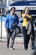 EMILY V. GORDON and Kumail Nanjiani at a Covid-19 Testing Site in Los Angeles 01/09/2022